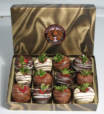 Fresh Large Strawberries | 12 Piece Box - Large fresh strawberries are dipped in pure milk, dark and white chocolate and decorated in contrasting drizzle.  This is a fantastic presentation in our signature box.  Since the berries are perishable, they must be shipped by "next day air" on orders delivered outside of Ohio.
