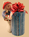 Blue Box & Snowman | Mini Chocolate Pretzels  - This special plush snowman is holding a large round box of chocolate mini pretzels.  A decorative bow is attached at the top.