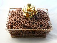Golden Tray - Mini Pretzels - Beautiful golden mesh tray is lusciously filled with two and a half pounds of chocolate covered mini pretzels.  The tray is shrink wrapped with a large bow on top.