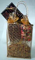 Gold Shopping Bag | Gourmet Nuts - This gold mesh shopping bag is filled with three large gold bags of whole smoked almonds, praline pecan halves, and natural pistachios in the shell.  Three pounds of gourmet nuts and all are wrapped in a large gift bag that is tied together with a large bow
